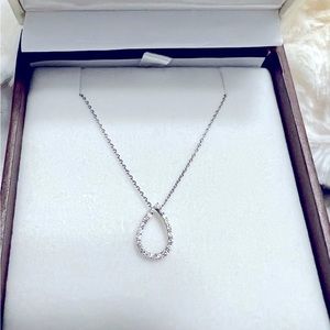 10k White Gold Diamond Pear Shape Pendant. Total Diamond Weight is 0.25CTW